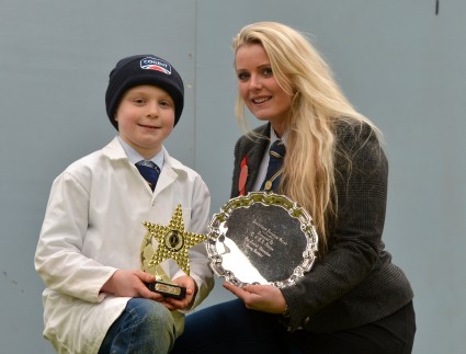 Junior Champion, Andrew Hamill with judge, Kirree Kermode